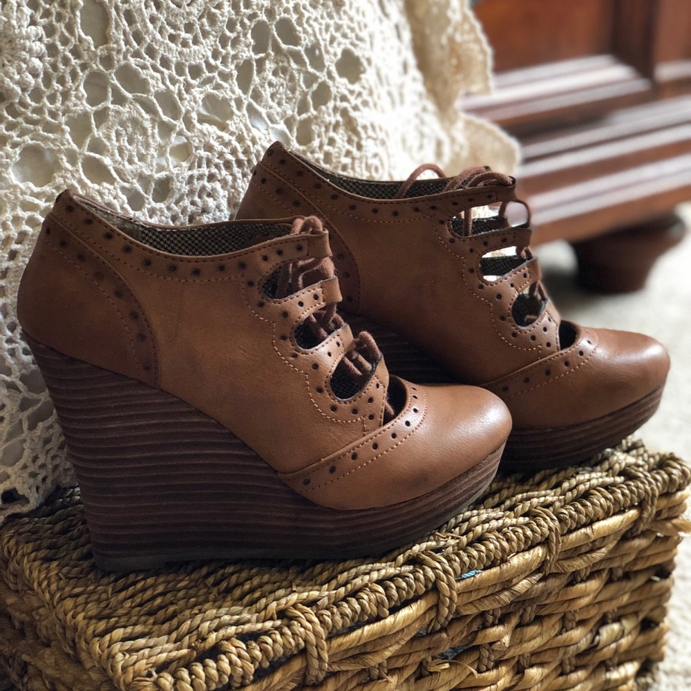 Restricted- brown lace-up wedges